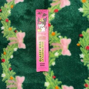 🆕 The Creme Shop x Hello Kitty - Glassy Kiss 💋 Lip Plumping Stick [Scary Berry]